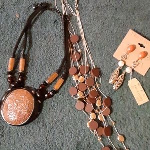 2 necklaces and earrings